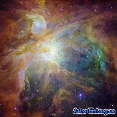 Spitzer and Hubble Create Colorful Masterpiece